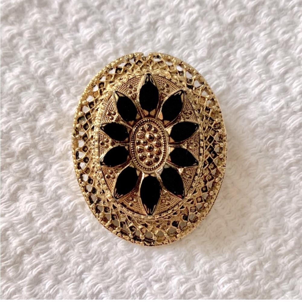 Pauline Raider Brooch